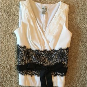 Sleeveless faux wrap blouse with black lace